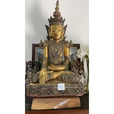 A Large mica-inlaid, gilt dry-lacquer figure of Buddha