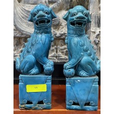 A pair of Chinese turquoise dogs