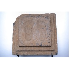 A Buddhapada (footprint of the Buddha) stone